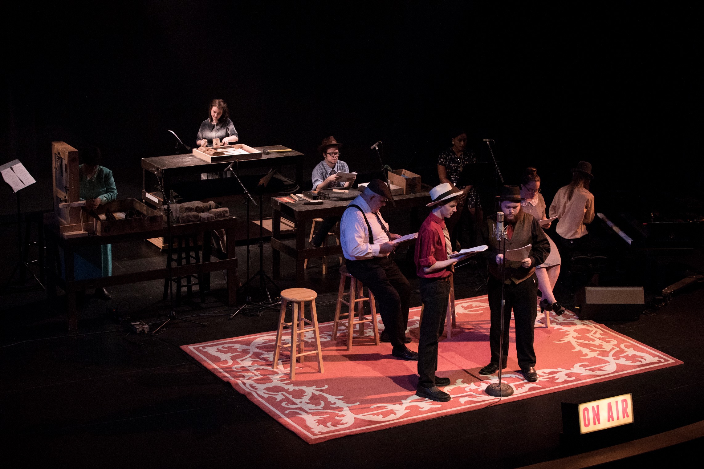 Students on stage at the Gracie Theatre